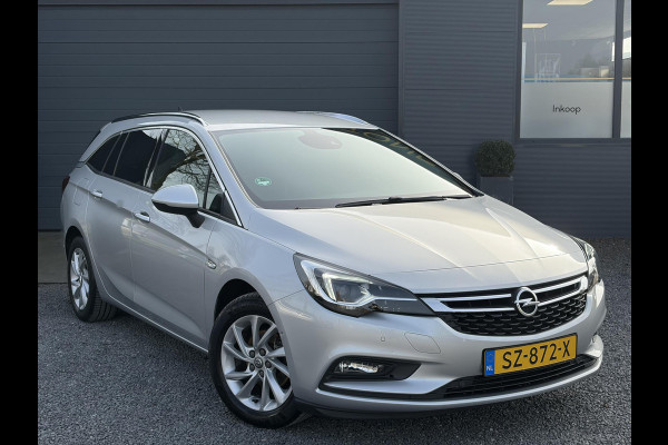 Opel Astra Sports Tourer 1.4 Innovation Dealer Onderhouden,Navi,Camera,Trekhaak,150pk,Keyless,Rijstrooksensor,Halfleder,2e Eigenaar,Lm velgen,BSD,PDC V+A,N.A.P,Apk tot 12-2026