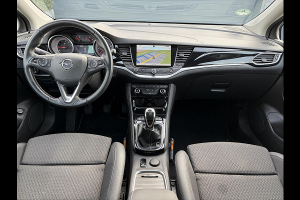 Opel Astra Sports Tourer 1.4 Innovation Dealer Onderhouden,Navi,Camera,Trekhaak,150pk,Keyless,Rijstrooksensor,Halfleder,2e Eigenaar,Lm velgen,BSD,PDC V+A,N.A.P,Apk tot 12-2026