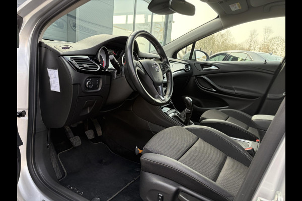 Opel Astra Sports Tourer 1.4 Innovation Dealer Onderhouden,Navi,Camera,Trekhaak,150pk,Keyless,Rijstrooksensor,Halfleder,2e Eigenaar,Lm velgen,BSD,PDC V+A,N.A.P,Apk tot 12-2026