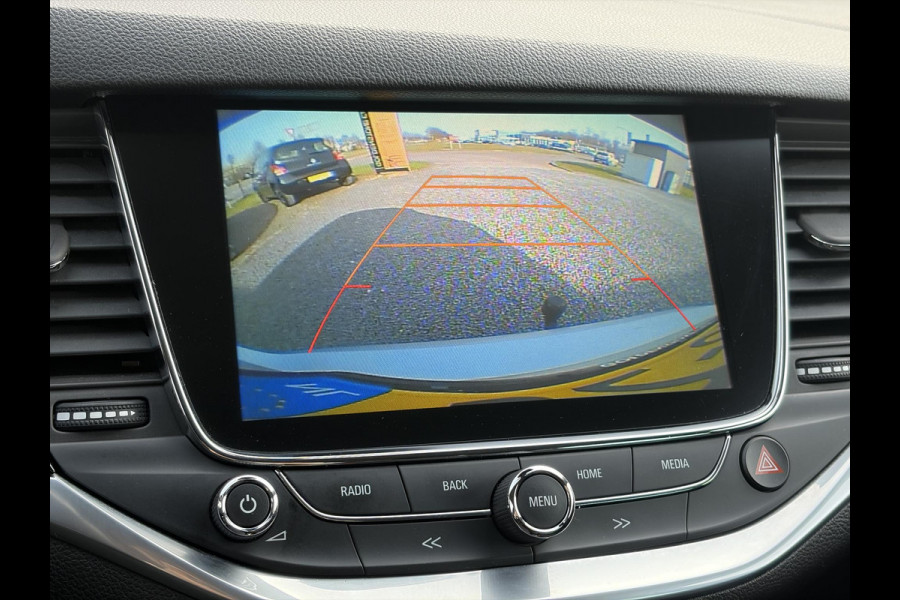 Opel Astra Sports Tourer 1.4 Innovation Dealer Onderhouden,Navi,Camera,Trekhaak,150pk,Keyless,Rijstrooksensor,Halfleder,2e Eigenaar,Lm velgen,BSD,PDC V+A,N.A.P,Apk tot 12-2026