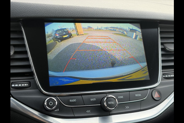 Opel Astra Sports Tourer 1.4 Innovation Dealer Onderhouden,Navi,Camera,Trekhaak,150pk,Keyless,Rijstrooksensor,Halfleder,2e Eigenaar,Lm velgen,BSD,PDC V+A,N.A.P,Apk tot 12-2026