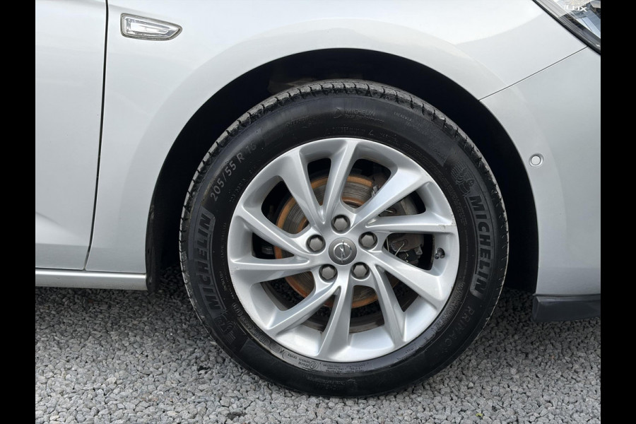 Opel Astra Sports Tourer 1.4 Innovation Dealer Onderhouden,Navi,Camera,Trekhaak,150pk,Keyless,Rijstrooksensor,Halfleder,2e Eigenaar,Lm velgen,BSD,PDC V+A,N.A.P,Apk tot 12-2026