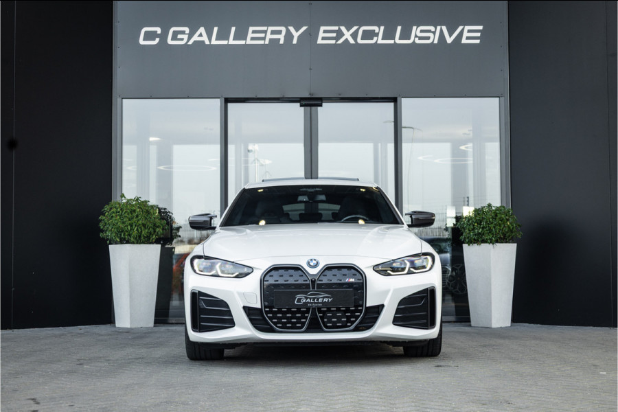 BMW i4 M50 High Executive 84 kWh - M Sport | Panorama | Carbon | 360 Camera | Sportstoelen