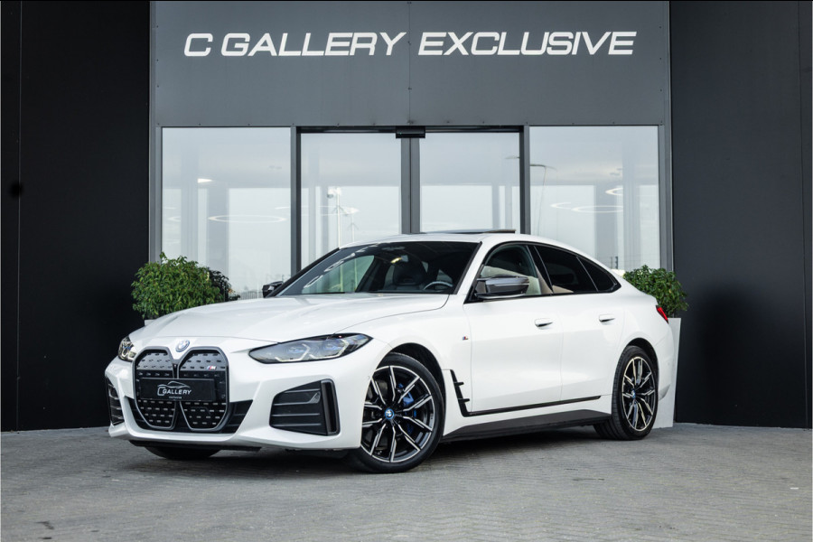 BMW i4 M50 High Executive 84 kWh - M Sport | Panorama | Carbon | 360 Camera | Sportstoelen