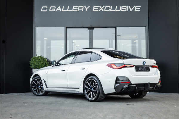 BMW i4 M50 High Executive 84 kWh - M Sport | Panorama | Carbon | 360 Camera | Sportstoelen