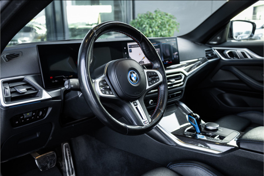 BMW i4 M50 High Executive 84 kWh - M Sport | Panorama | Carbon | 360 Camera | Sportstoelen