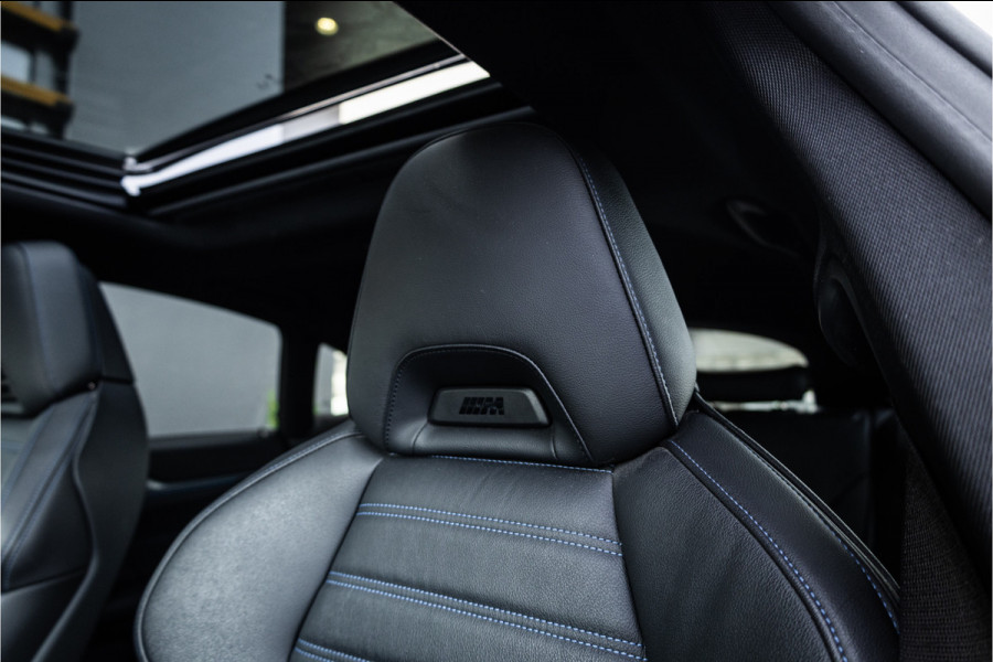 BMW i4 M50 High Executive 84 kWh - M Sport | Panorama | Carbon | 360 Camera | Sportstoelen