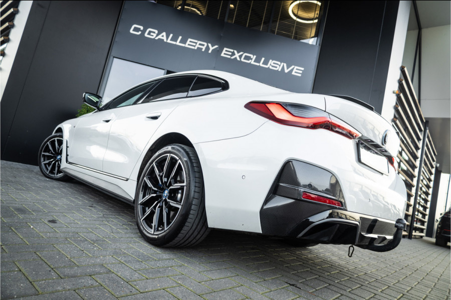 BMW i4 M50 High Executive 84 kWh - M Sport | Panorama | Carbon | 360 Camera | Sportstoelen