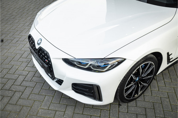 BMW i4 M50 High Executive 84 kWh - M Sport | Panorama | Carbon | 360 Camera | Sportstoelen