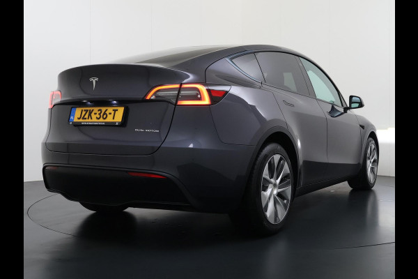 Tesla Model Y Long Range AWD 75 kWh VAN €38.900,- NU VOOR SLECHTS €35.877,- Uw LENTEVOORDEEL €3.023,- |SOH 96% | AFNEEMBARE TREKHAAK | STOEL- EN STUURVERWARMING | FABRIEKSGARANTIE |