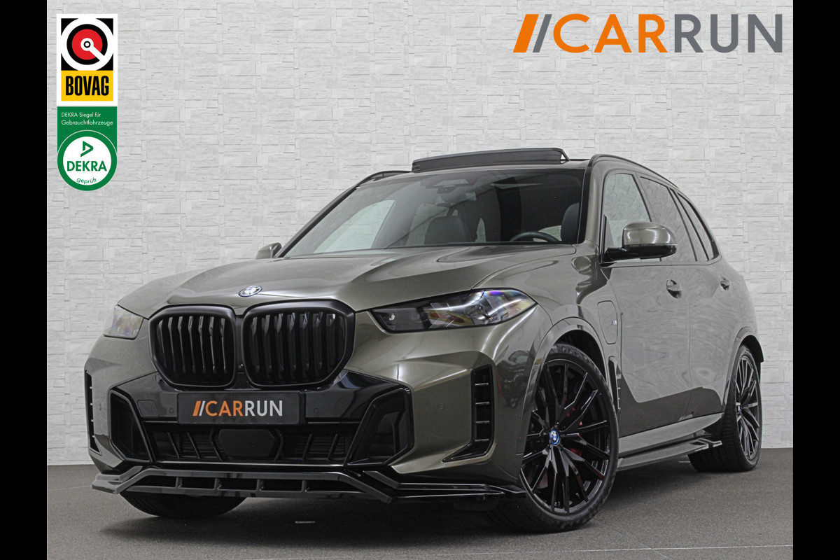 BMW X5 50e M-Sport Pro | Panorama | 360 Camera | ACC | Carbon | Individual Leder | Trekhaak | Head-Up | Keyless-Entry | Harman-Kardon | Stoelverwarming V+A | Memory | Stuurverwarming | 22 inch | Iconic-Glow | M-Gordels | ISO-Glas | Zonwering | Beker Clima | Standkachel | Carplay | Draadloos Laden |