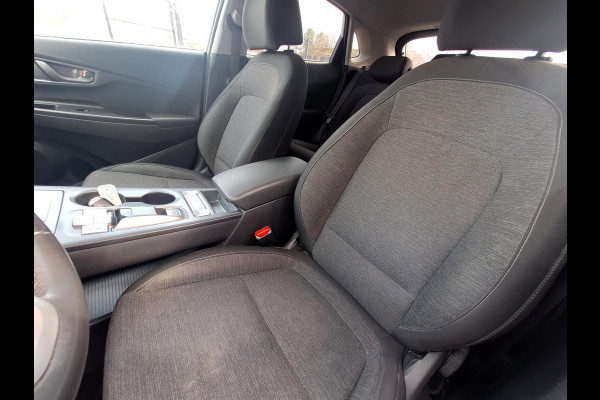 Hyundai Kona EV Fashion 64 kWh | SOH: nnb | 3 Fase | Warmtepomp | HUD | Navi | Adaptive CC | Blindspot |