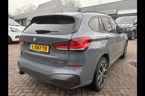 BMW X1 xDrive25e eDrive M Sport | SCI | Bellen voor bezichtiging  | Plug-in Hybride | PHEV | 220pk | Panoramadak | Storm Bay Metallic | 19 inch | M Pakket | Camera | Sportstoelen | Led verlichting | Head Up Display | Shadowline Exterieur | | SCI
