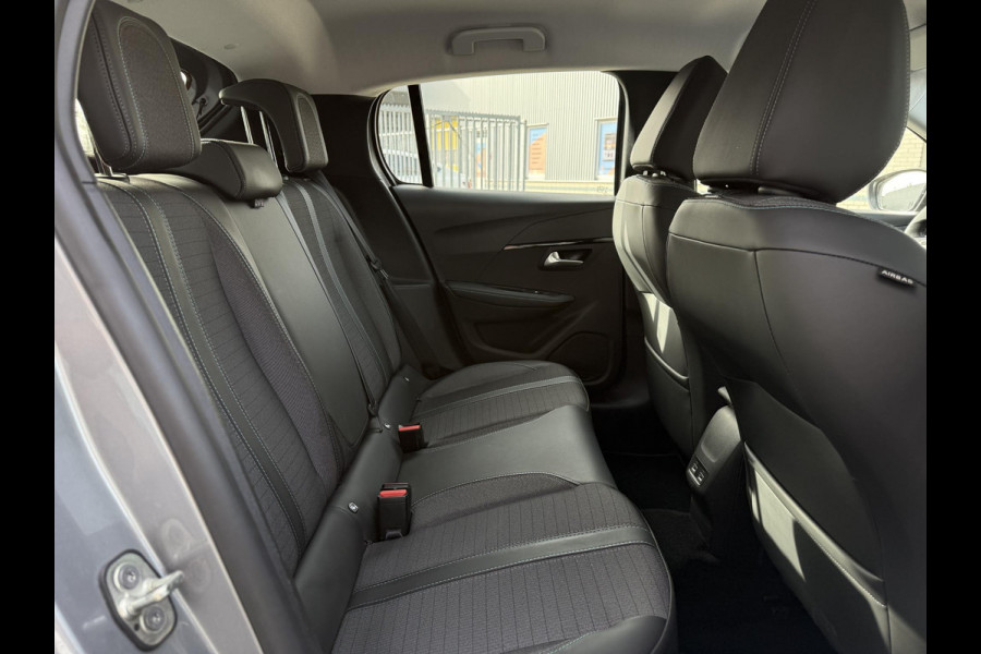 Peugeot e-208 Aut. EV Allure Pack | SoH 87% | Navi | Camera | Stoel Verarming |