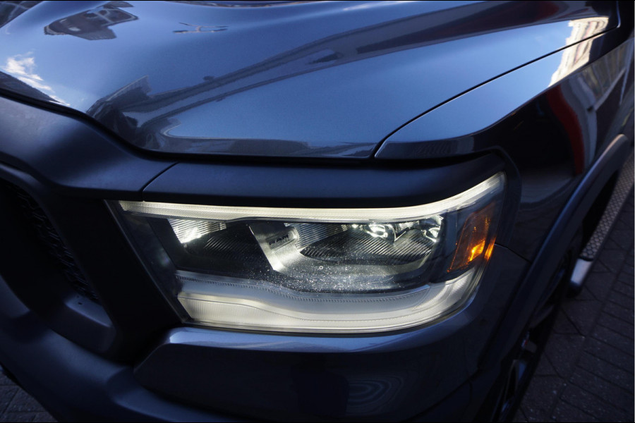 Dodge Ram 1500 5.7 V8 4x4 Rebel Sport | Luchtvering PANO -dak | Black Line | Off Road | Groot Navi | Apple CarPlay | Keyless | 20inch | Harman Kardon | Full LED | LPG onderbouw |3/2026 beurt + 4x Banden  | excl BTW