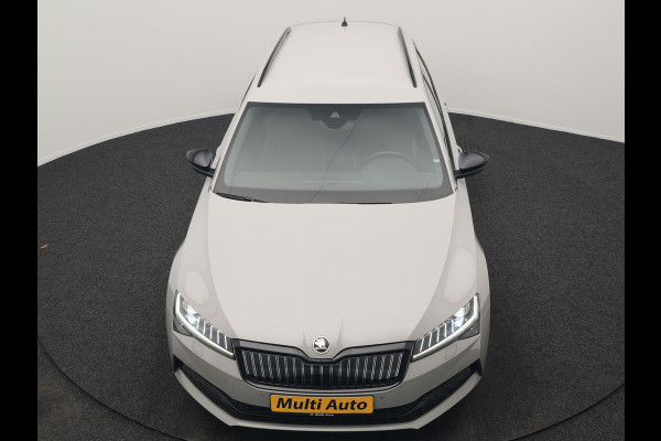 Škoda Superb Combi 1.4 TSI iV Sportline Business Plug In Hybrid 218pk Dealer O.H. PHEV | Trekhaak Af Fabriek | Adaptive Cruise | 360 Camera | Canton Audio | Alcantara Sportstoelen Memory & Verwarmd | Sfeerverlichting | Stuur Verwarmd | Keyless | Crystal LED | DAB |