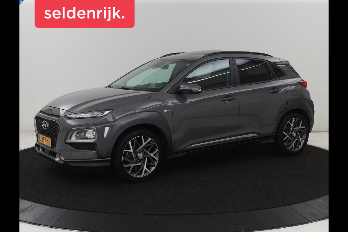 Hyundai Kona 1.6 GDI HEV Premium Sky | Schuifdak | Leder | Stoelventilatie | Adaptive cruise | Trekhaak | Head-Up | Carplay | Camera | Achterbankverwarming | Navigatie | Keyless | Climate control