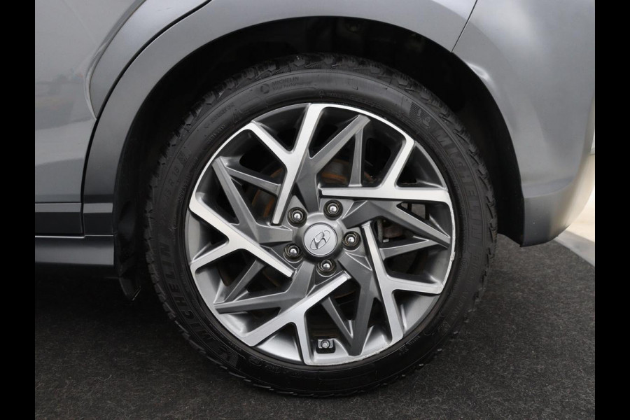 Hyundai Kona 1.6 GDI HEV Premium Sky | Schuifdak | Leder | Stoelventilatie | Adaptive cruise | Trekhaak | Head-Up | Carplay | Camera | Achterbankverwarming | Navigatie | Keyless | Climate control