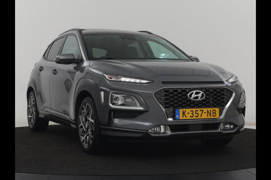 Hyundai Kona 1.6 GDI HEV Premium Sky | Schuifdak | Leder | Stoelventilatie | Adaptive cruise | Trekhaak | Head-Up | Carplay | Camera | Achterbankverwarming | Navigatie | Keyless | Climate control
