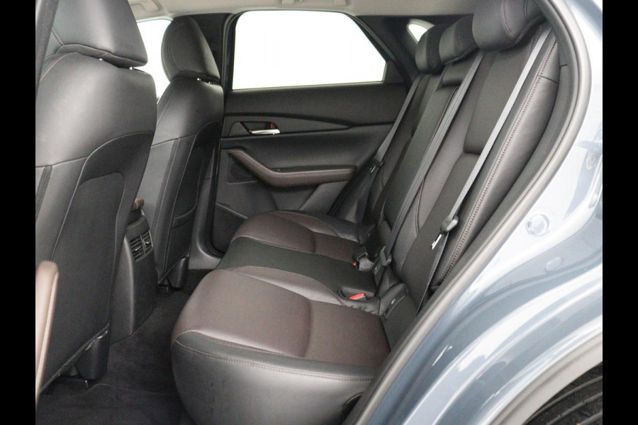 Mazda CX-30 2.0 e-SkyActiv-X M Hybrid Luxury | Leder | Stoelverwarming | Head-Up | Adaptive cruise | Camera | BOSE Sound | Carplay | Navigatie | Keyless | Full LED | Memory | Parkeerhulp