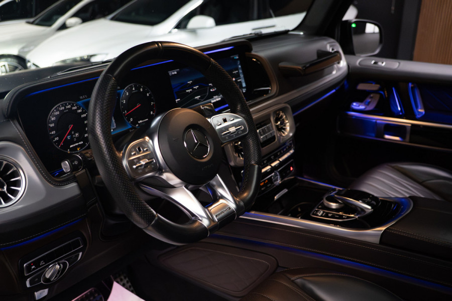 Mercedes-Benz G-Klasse 63 Navi Burmester Leer 360 Camera PTS Massage Schuif (kantel) dak Memory seats Stoelventilatie Stoelverwarming Climate voor en achter Distronic+ Trekhaak