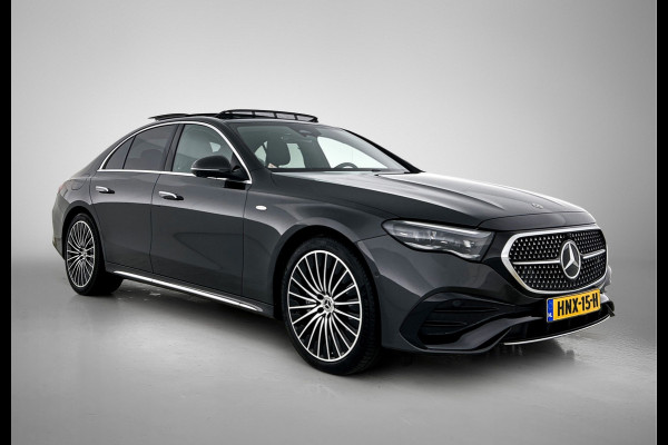 Mercedes-Benz E-Klasse 300 e Sport Edition AMG Line | Panorama Schuif-Kanteldak | Distronic | Lederen bekleding | Alarm | Parkeerpakket met 360°-camera | 20 Inch AMG Velgen. Inclusief 24 maanden MB Certified garantie voor Europa.