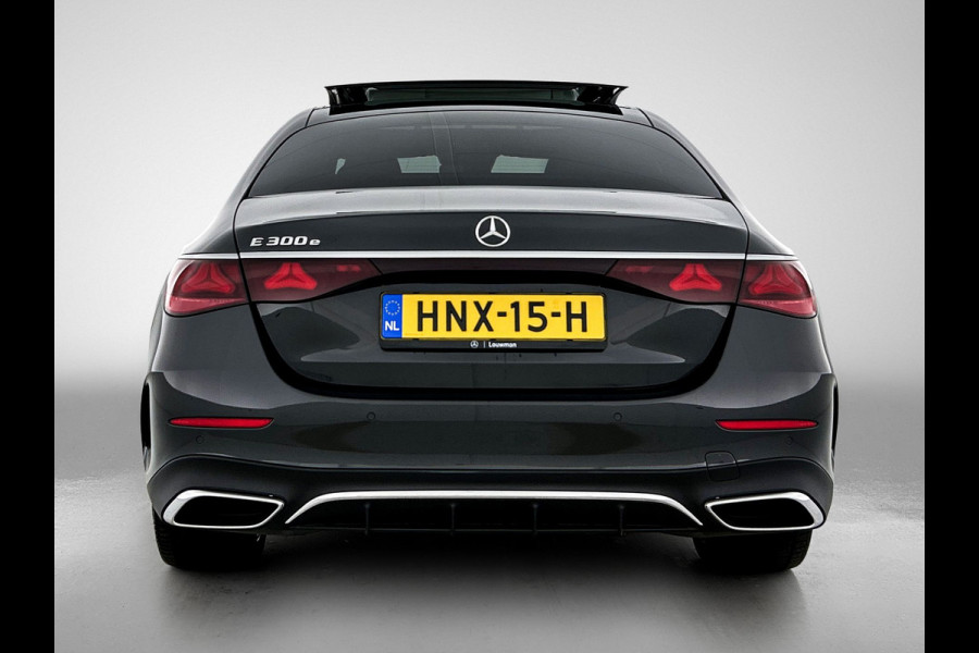 Mercedes-Benz E-Klasse 300 e Sport Edition AMG Line | Panorama Schuif-Kanteldak | Distronic | Lederen bekleding | Alarm | Parkeerpakket met 360°-camera | 20 Inch AMG Velgen. Inclusief 24 maanden MB Certified garantie voor Europa.