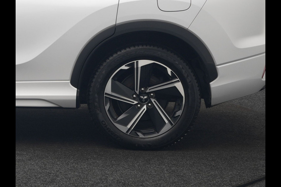 Mitsubishi Eclipse Cross 2.4 Instyle PHEV 188pk Dealer O.H. | Trekhaak Af Fabriek | Panodak | Head Up | Adaptive Cruise | 360 Camera | Lederen Sportstoelen Verwarmd | Keyless | Stuur Verwarmd | Apple Carplay | Blis | Navigatie | DAB | Plug In Hybrid |