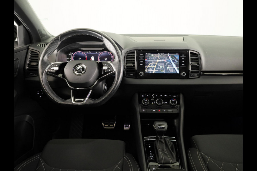 Škoda Karoq 1.5 TSI ACT Sportline Business 150 pk Automaat (DSG) | Verlengde garantie | Navigatie | Panoramadak | Parkeersensoren | Achteruitrijcamera | Stoelverwarming |