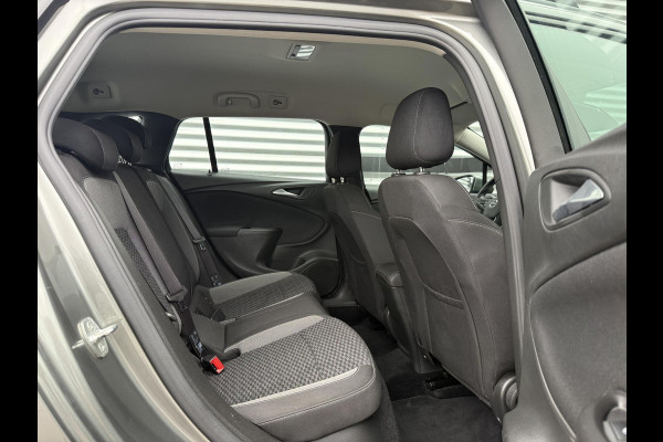 Opel Astra Sports Tourer 1.2 Business Edition 2e Eigenaar,Apple Carplay,Airco,Camera,Cruise,PDC,Trekhaak,N.A.P,APK tot 07-2026