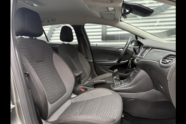 Opel Astra Sports Tourer 1.2 Business Edition 2e Eigenaar,Apple Carplay,Airco,Camera,Cruise,PDC,Trekhaak,N.A.P,APK tot 07-2026