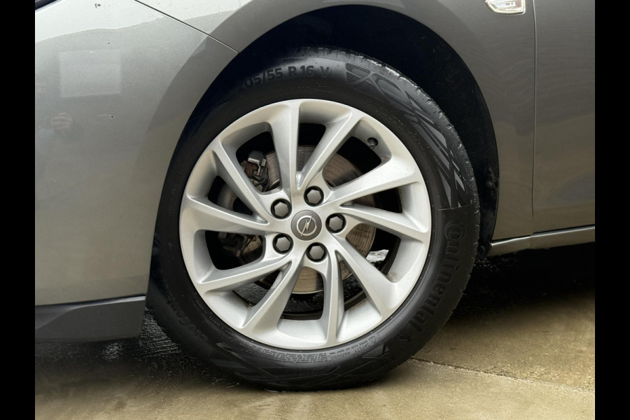 Opel Astra Sports Tourer 1.2 Business Edition 2e Eigenaar,Apple Carplay,Airco,Camera,Cruise,PDC,Trekhaak,N.A.P,APK tot 07-2026