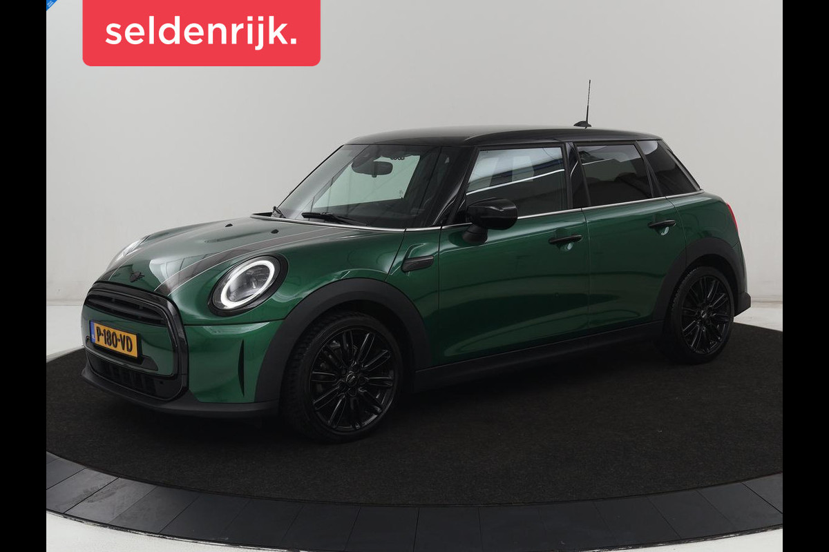 MINI Cooper 1.5 Business Edition | Harman/Kardon | Carplay | Verwarmde voorruit | Navigatie | Full LED | Half leder | Parkeerhulp | Climate control | Cruise control | Bluetooth | British Racing Green