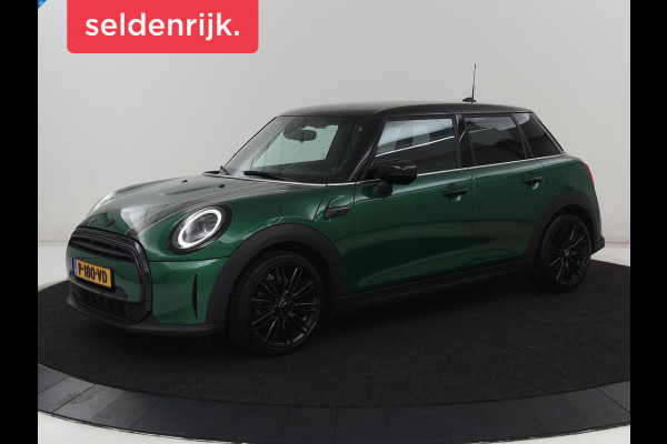 MINI Cooper 1.5 Business Edition | Harman/Kardon | Carplay | Verwarmde voorruit | Navigatie | Full LED | Half leder | Parkeerhulp | Climate control | Cruise control | Bluetooth | British Racing Green