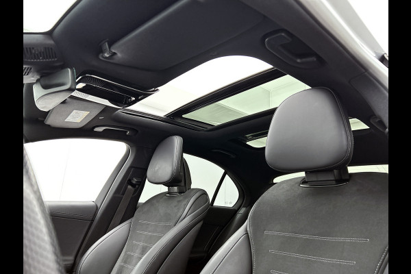 Mercedes-Benz C-Klasse 300 e Business Solution AMG AMG Line | Panorama Schuif-Kanteldak | Distronic | Lederen bekleding | Alarm | Parkeerpakket met 360°-camera | 20 Inch AMG Velgen. Inclusief 24 maanden Mercedes-Benz Certified garantie voor Europa.