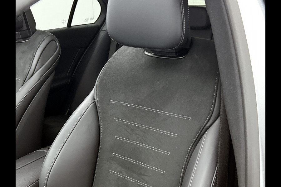 Mercedes-Benz C-Klasse 300 e Business Solution AMG AMG Line | Panorama Schuif-Kanteldak | Distronic | Lederen bekleding | Alarm | Parkeerpakket met 360°-camera | 20 Inch AMG Velgen. Inclusief 24 maanden Mercedes-Benz Certified garantie voor Europa.