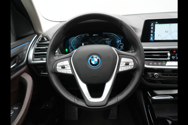 BMW X3 xDrive30e Business Edition Plus PHEV 293pk FACELIFT Dealer O.H. | Trekhaak Af Fabriek | Panodak | Head Up | Adaptive Cruise | Adaptief Onderstel | Lederen Sportstoelen Memory & Ventilatie | Camera | Keyless | Apple Carplay | Navigatie | Virtual | Plug In