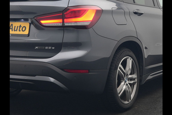 BMW X1 xDrive25e Sportline PHEV 221pk Dealer O.H | Trekhaak Afn. | Panodak | Head Up | Lederen Sportstoelen Memory & Verwarmd | Camera | Apple Carplay | Keyless | Sfeerverlichting | Navigatie | DAB | Plug in Hybrid |