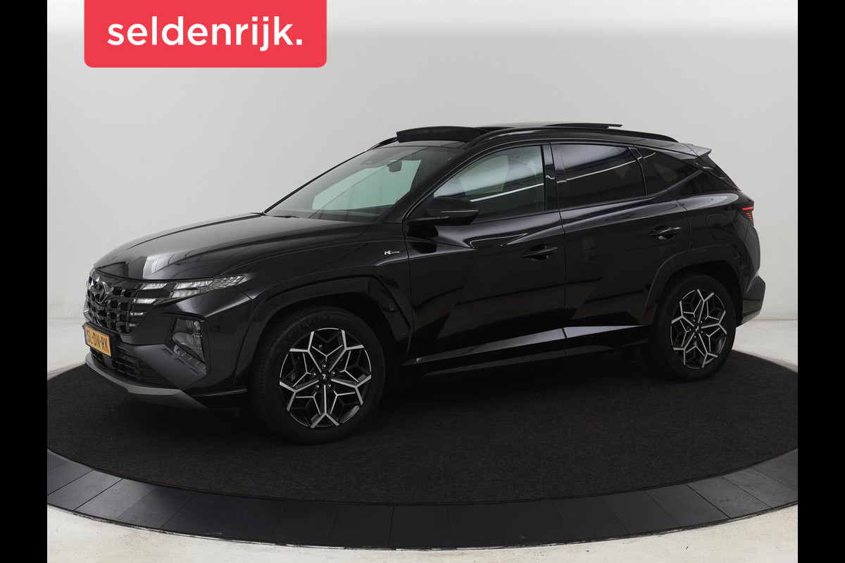 Hyundai Tucson 1.6 T-GDI PHEV N Line Sky 4WD | Panoramadak | Stoelverwarming | Leder/Alcantara | Camera | Adaptive cruise | Carplay | Full LED | Stuurverwarming | Keyless | Plug In