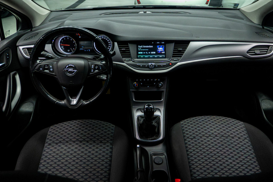 Opel Astra Sports Tourer 1.2T Navi Stoel- & stuurverw. Airco Carplay PDC Cruise BTW auto