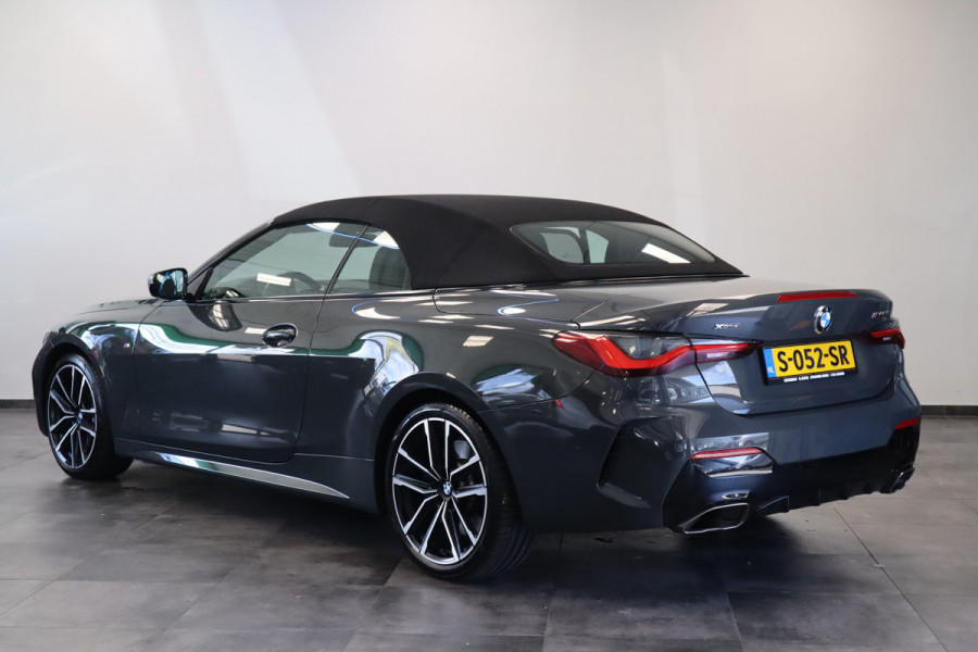 BMW 4 Serie Cabrio M440i xDrive High-Executive 374PK Individueel-lak Navigatie  Volleder 19LMV Head up