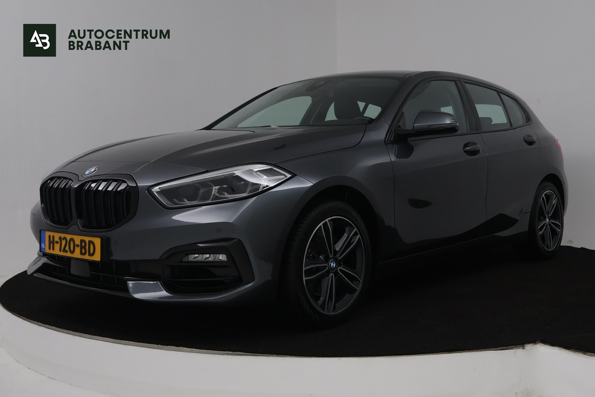 BMW 1-serie 118i High Executive Edition (NAVIGATIE, PARKEERSENSOREN, STOELVERWARMING, LEDER, SPORTSTOELEN, LED)