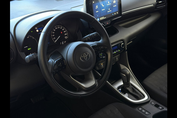 Toyota Yaris 1.5 HYBRID STOEL/STUUR VERW CARPLAY CAMERA LMV ADAP.CRUISE ✅ Top Auto's Wijchen , Al 30 Jaar verkoop van Toyota , Type's Launch / Executive / Dynamic / First Edition / Business / Zowel Phev / Hev / Benzine / met fabrieksgarantie ✅