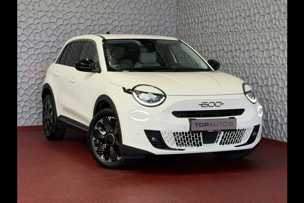 Fiat 600 1.2 HYBRID LA PRIMA LEER MASSAGE ELEK.STOEL CAMERA CARPLAY ADAP.CRUISE STOELVERW. ELEK.KLEP 18''LMV ✅ Top Auto Fiat Wijchen , 30 Jaar ervaring in Fiat , Wij leveren de : Icon / La Prima / Pop / Sport . Urban / Benzine / Hybrid . Met Fabrieksgarantie ✅