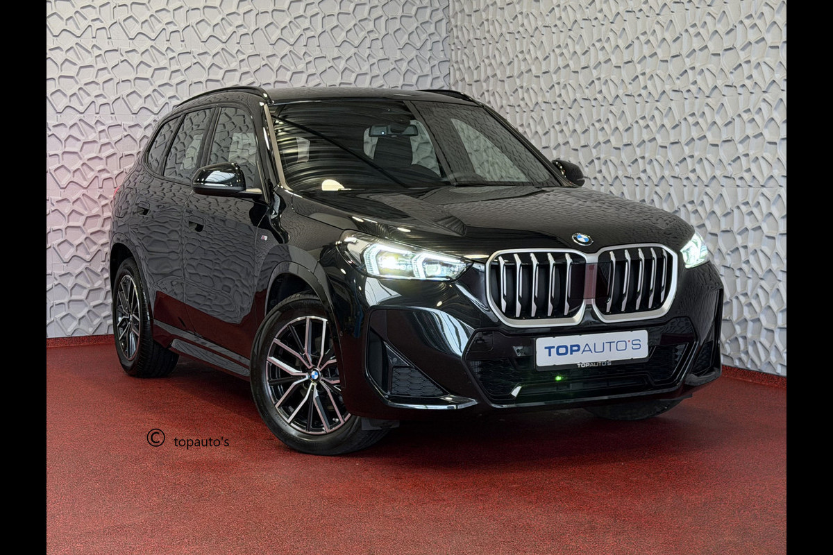 BMW X1 SDRIVE M-SPORT SHADOW LINE NAVI LED ELEK.KLEP CRUISE LEER/ALCANTARA CAMERA M-SPORT INTERIEUR / EXTERIEUR ✅ Top Auto's. Al 30 Jaar uw Bmw Specialist in ,  BMW M / M Sport / PHEV / HEV / Hybrid / Mhev / 25e / 30e / xDrive25e // xDrive30e / sDrive18i / sDrive20i / sDrive23i ✅