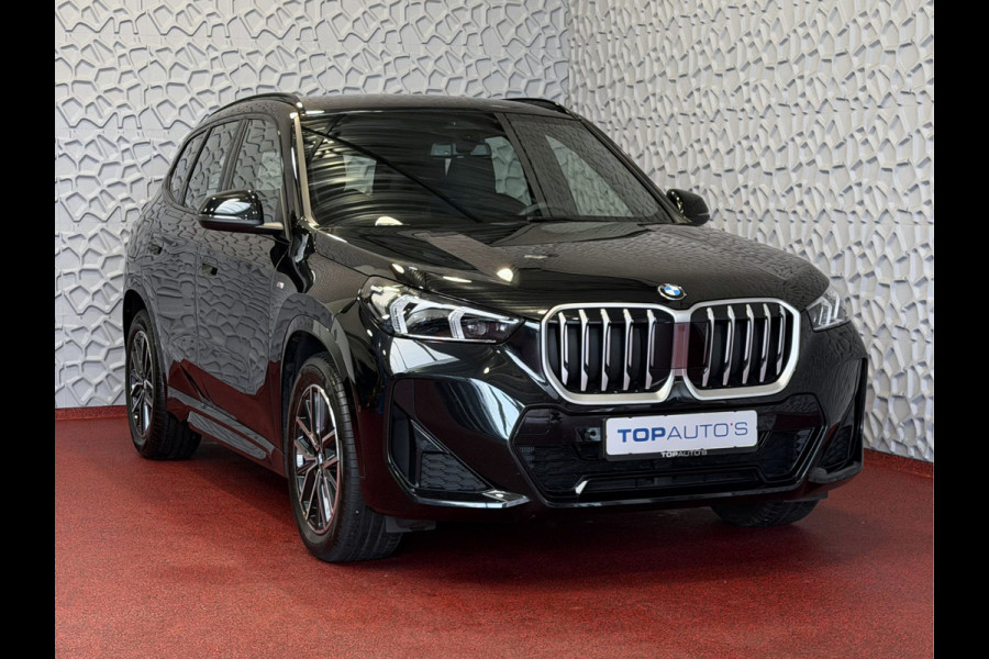BMW X1 SDRIVE M-SPORT SHADOW LINE NAVI LED ELEK.KLEP CRUISE LEER/ALCANTARA CAMERA M-SPORT INTERIEUR / EXTERIEUR ✅ Top Auto's. Al 30 Jaar uw Bmw Specialist in ,  BMW M / M Sport / PHEV / HEV / Hybrid / Mhev / 25e / 30e / xDrive25e // xDrive30e / sDrive18i / sDrive20i / sDrive23i ✅