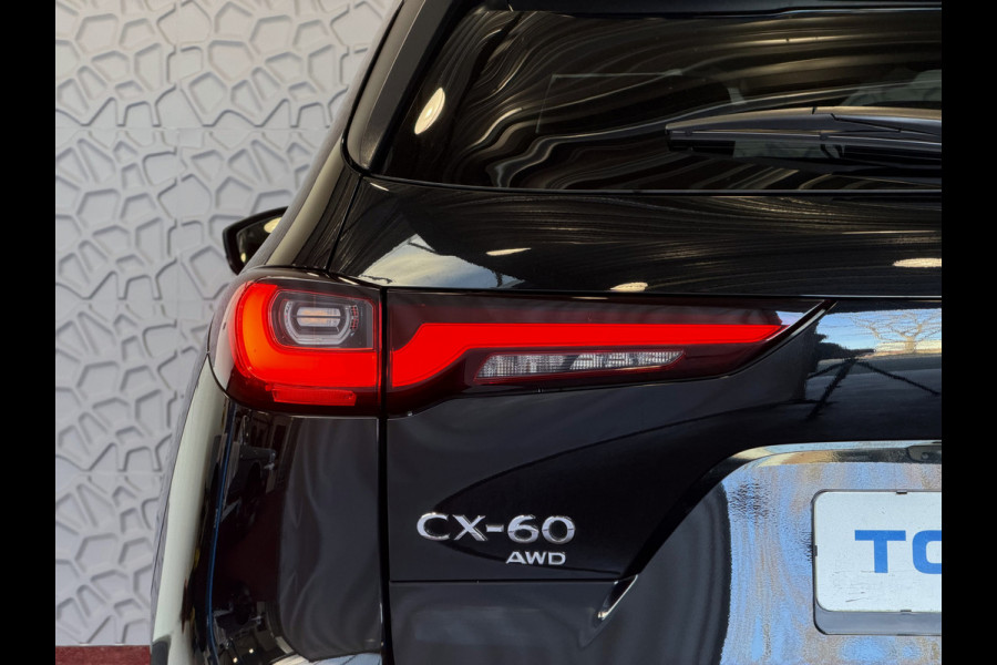 Mazda CX-60 2.5 e-SkyActiv PHEV HOMURA ELEK.STOEL PANO SCHUIFDAK STOEL/STUUR.VERW/VENTILATIE HEADUP AWD 4X4 4WD ✅ Top Auto's Wijchen. Al 30 Jaar verkoop van Mazda , Alle Modellen PHEV / HEV / BENZINE✅
