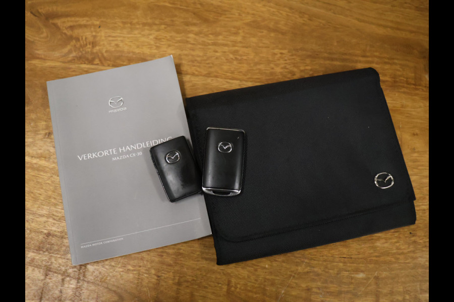 Mazda CX-30 2.0 e-SkyActiv-X M Hybrid Comfort [TREKHAAK AFNEEMBAAR, MEMORY SEATS, BOSE SOUND, HEAD-UP, STUURVERWARMING, CAMERA, ADAPTIVE CRUISE, VOL LEDER, STOELVERWARMING, BLUETOOTH, CLIMATE, NIEUWSTAAT]