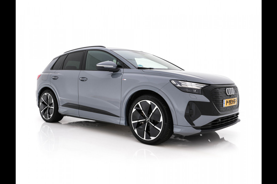 Audi Q4 e-tron 40 Launch edition S Competition 77 kWh [ 3-Fase ] {SOH-93%} (INCL-BTW) *HEATPUMP | LEATHER-FABRIC | MATRIX-LED | ADAPTIVE-CRUISE | HEATED-SPORTSEATS | AMBIENTLIGHT | DIGI-COCKPIT | CAMERA | KEYLESS | DAB+ | NAVI-FULLMAP | TOWBAR | PRIVACYGLASS | 21"AL