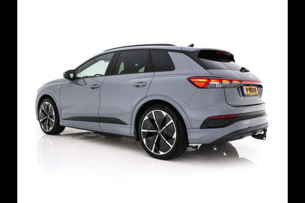 Audi Q4 e-tron 40 Launch edition S Competition 77 kWh [ 3-Fase ] {SOH-93%} (INCL-BTW) *HEATPUMP | LEATHER-FABRIC | MATRIX-LED | ADAPTIVE-CRUISE | HEATED-SPORTSEATS | AMBIENTLIGHT | DIGI-COCKPIT | CAMERA | KEYLESS | DAB+ | NAVI-FULLMAP | TOWBAR | PRIVACYGLASS | 21"AL